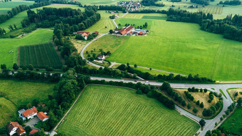 Top view aerial photo of settlements and fields